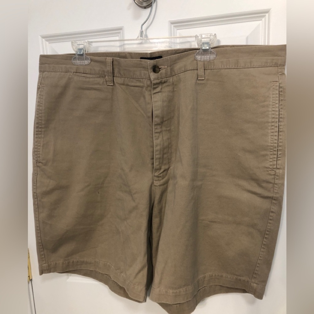 Dockers khaki shorts. Flat front. Pockets side and back(w/buttons).  Size 42